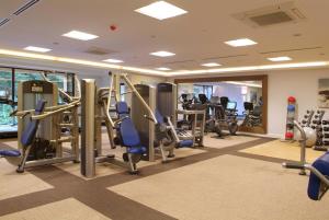 a gym with treadmills and elliptical machines at Armathwaite Hall Hotel & Spa in Bassenthwaite