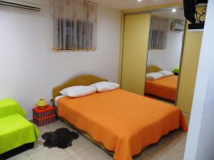 En eller flere senge i et værelse på Apartments Villa Dube