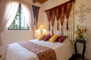 Postel nebo postele na pokoji v ubytování Hacienda La Moreda Hotel Boutique & Spa