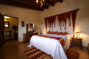 Postel nebo postele na pokoji v ubytování Hacienda La Moreda Hotel Boutique & Spa