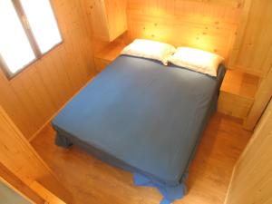 Postel nebo postele na pokoji v ubytování Campeggio Valle Gesso