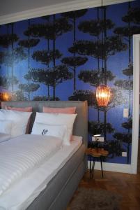 Ein Bett oder Betten in einem Zimmer der Unterkunft My Home in Vienna - Smart Apartments - Margareten