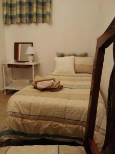 Ένα ή περισσότερα κρεβάτια σε δωμάτιο στο Casa dolce Casa