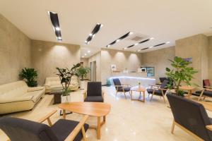Posezení v ubytování Reborn Suwon Silkroad Hotel