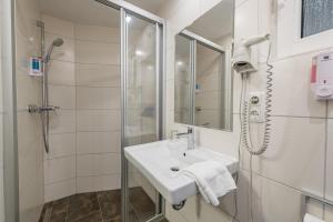Koupelna v ubytování Hotel Windsor