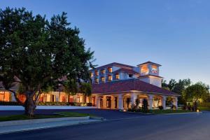 a large building with a clock tower on top of it at Hyatt Regency Westlake in Westlake Village