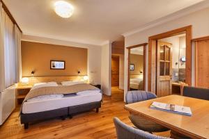 Voodi või voodid majutusasutuse Hotel Marmolada toas