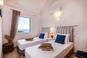 Postel nebo postele na pokoji v ubytování Villas Muscalas by Konnect, 200m from the Beach