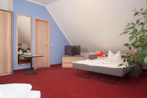Posezení v ubytování Hotel 3 Linden