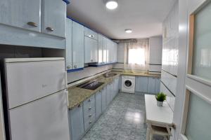 Kuchyňa alebo kuchynka v ubytovaní WonderStays Apartamento Boqueron