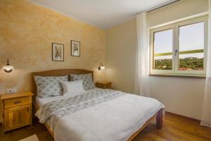 Postel nebo postele na pokoji v ubytování Villa Fundica + 37 fotografií