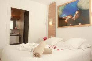Résidence Hôtelière Natureva & Spa客房内的一张或多张床位