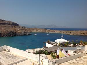 a view of a body of water with boats in it at Villa Vasilia in Lindos