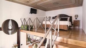 Postel nebo postele na pokoji v ubytování Nobildonne Relais