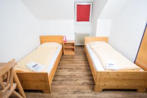 Posteľ alebo postele v izbe v ubytovaní YoHo - International Youth Hostel