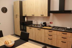 Kuchyň nebo kuchyňský kout v ubytování Vista Reale Apartment