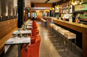 En restaurant eller et andet spisested på Saillant Hotel Maastricht City Centre - Auping Hotel Partner