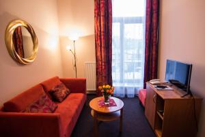 TV a/nebo společenská místnost v ubytování Hotel Hron