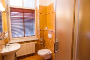 Koupelna v ubytování Hotel Hron