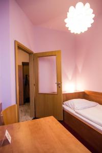 Postel nebo postele na pokoji v ubytování Hotel Hron