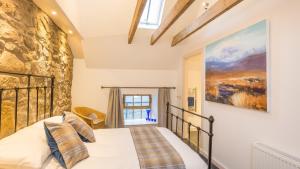 Tempat tidur dalam kamar di Hayloft Edinburgh