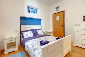 Postel nebo postele na pokoji v ubytování Hotel Sansegus