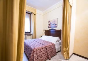 Letto o letti in una camera di Limone Palace Aparthotel