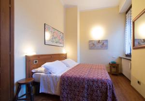 Letto o letti in una camera di Limone Palace Aparthotel