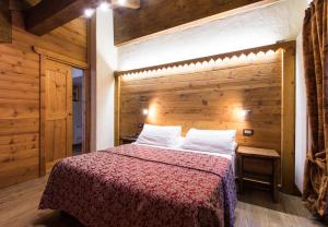 Letto o letti in una camera di Limone Palace Aparthotel