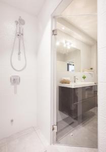 a bathroom with a shower and a sink at Villa Sima in Makarska