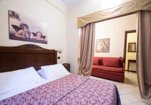 Letto o letti in una camera di Limone Palace Aparthotel