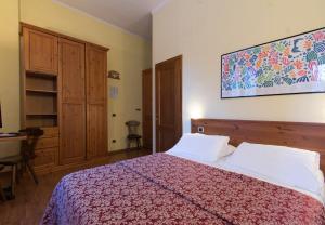 Letto o letti in una camera di Limone Palace Aparthotel
