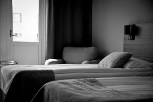 Postel nebo postele na pokoji v ubytování Apple Hotel & Konferens Göteborg