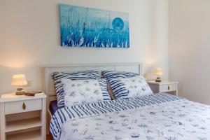 Postel nebo postele na pokoji v ubytování Hotel Sansegus