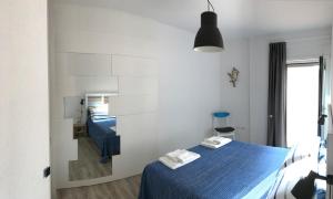 Кровать или кровати в номере A Casa di Leo