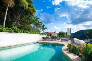 A piscina localizada em Hotel Solar do Rosário ou nos arredores