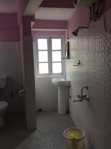 Koupelna v ubytování Smriya Homestay