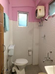 Koupelna v ubytování Smriya Homestay