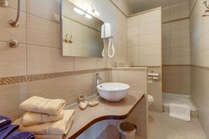 Koupelna v ubytování Hotel Sansegus