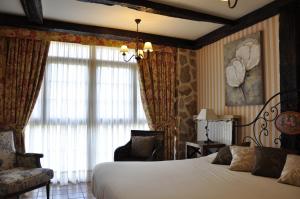 Cama o camas de una habitación en Akla La Casa Del Puente