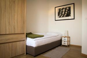 Posteľ alebo postele v izbe v ubytovaní Apartmani Mursa