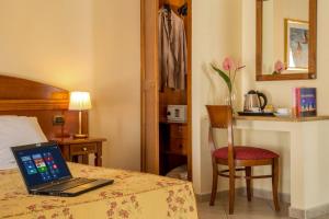 Postel nebo postele na pokoji v ubytování Marini Park Hotel