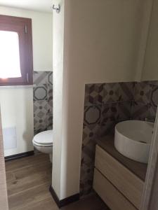 Koupelna v ubytování Bomarosa B&B