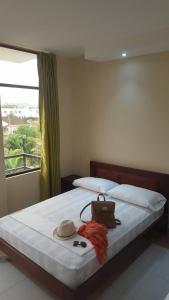 Postel nebo postele na pokoji v ubytování La Bocana