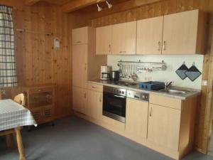 Kuchyň nebo kuchyňský kout v ubytování Ferienhaus Zinnöcker