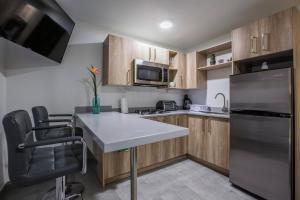 Imagen de la galería de TuribanaPlaza, en Palm-Eagle Beach