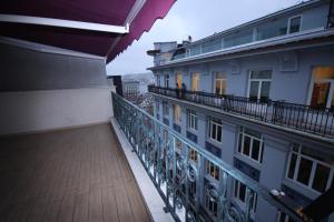 a balcony of a building with a view of the city at Vita Suites Karaköy in Istanbul