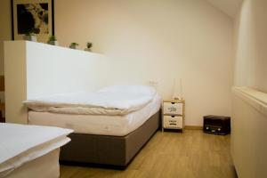 Posteľ alebo postele v izbe v ubytovaní Apartmani Mursa