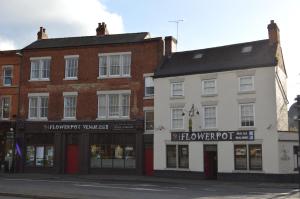a row of buildings on a city street at The Flowerpot in Derby