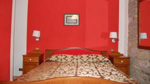 Postel nebo postele na pokoji v ubytování Albergo Miramonti